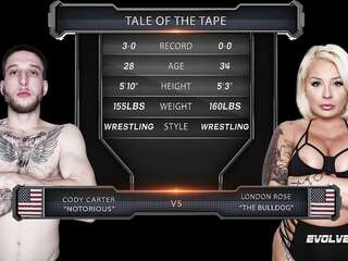 Tattooed blonde wrestles with a dude and then fucks