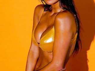 Nicole Scherzinger In a golden bathing suit to the music 2022