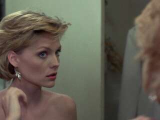 Young Michelle Pfeiffer flashing boobs