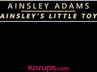 Dirty housewife Ainsley Adams toys her pussy