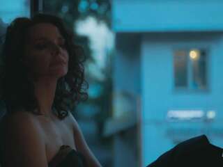 Elizaveta Boyarskaya sits naked on the windowsill