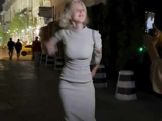 Oksana Streltsova lifts her skirt on set