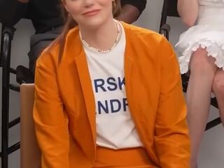 Emma Stone in a short skirt for an interview