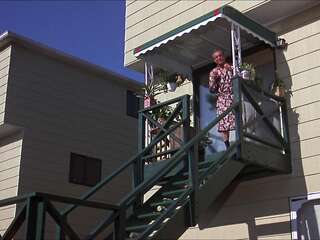 Blonde with big tits on the lawn